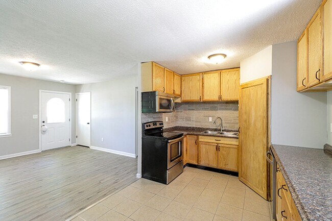 Building Photo - 3 Bedroom 1 Bath Fenced Shed Patio Brick Ranch Rental Home