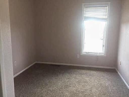 Building Photo - Spacious East Anchorage Home with Yard & Garage!