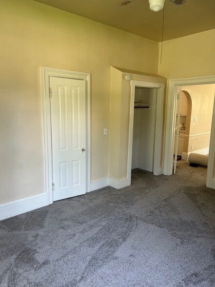 Bedroom looking into dining room - 828 N 3rd St