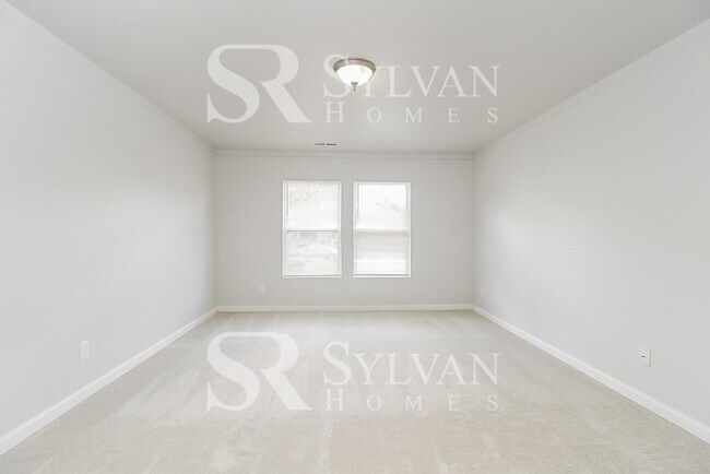 Building Photo - This adorable home is ready for your personal touch!