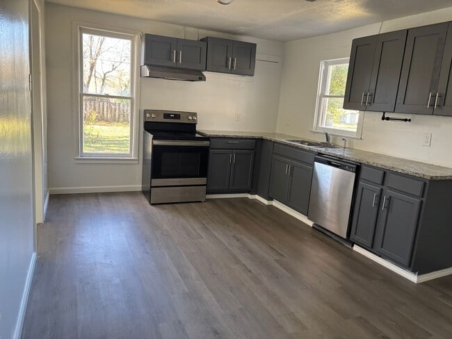 Building Photo - Modern Charm Meets Comfort: Fully Remodele...