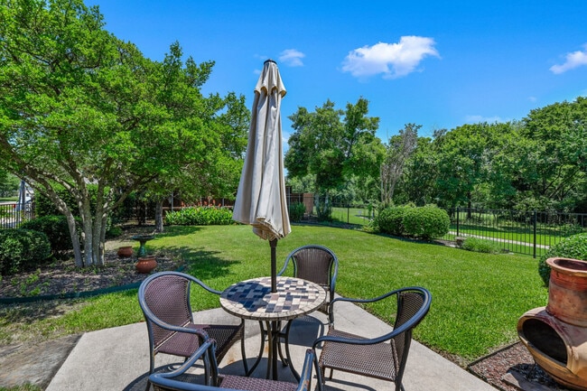 Enjoy the outdoor patio. Fenced yard great for dogs - 7300 Augusta Cir