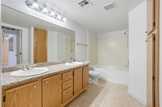 Building Photo - 5055 W Hacienda Ave