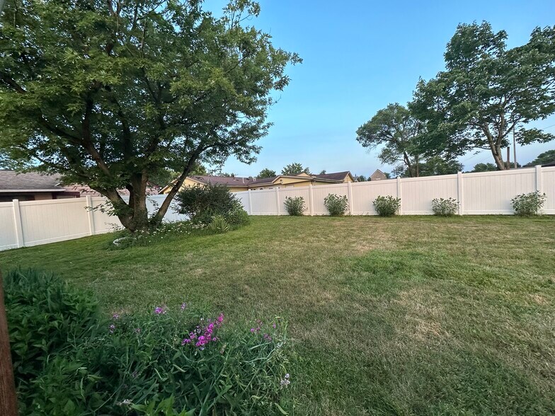 Fully fenced in backyard - 201 Sherwood Dr