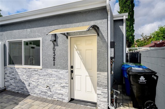 Building Photo - 10321 Sherman Grove Ave