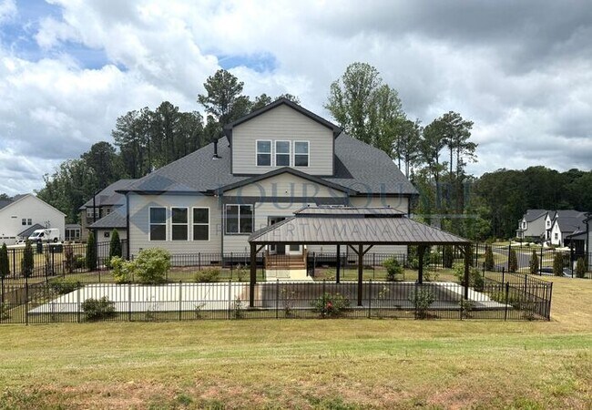 Building Photo - Elegant 4-Bed / 3.5-Bath Home with Main-Level Primary Suite, Quartz Kitchen & 3-Car Garage – In H...