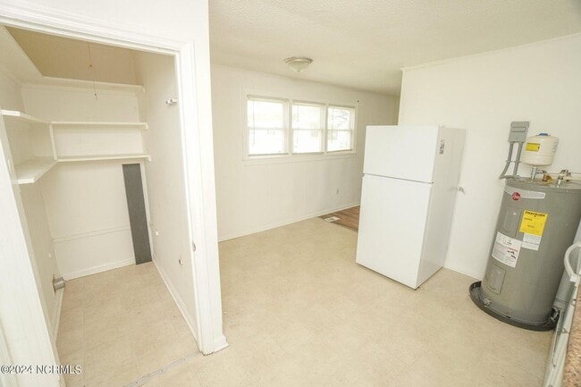 Building Photo - Lawn Care Included in Jville City Limits!