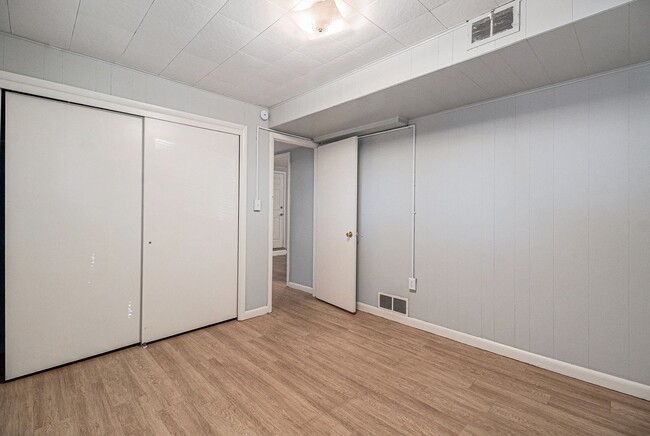 Building Photo - 7360 W.20th Ave. Unit B