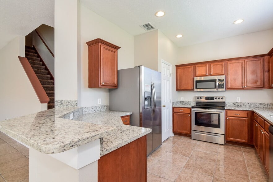 Building Photo - 11813 Mango Groves Blvd