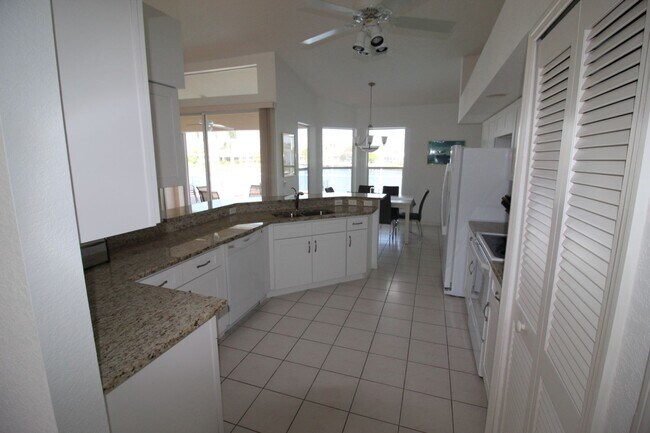 Building Photo - Short Term Rental ** Available 11/1/25 ** 3 Bed/2 Bath Pool Home ** Punta Gorda Isles** $7,500/mo