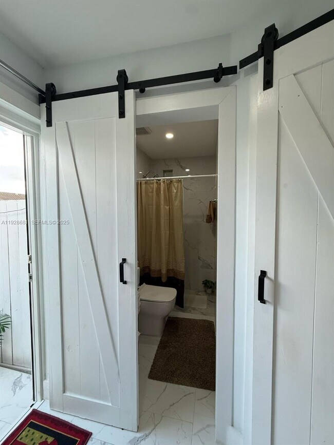 Building Photo - 2410 SW 143rd Ct