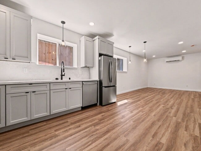 Building Photo - AVAILABLE MAY 1ST! Fully Remodeled Lower Unit with Private Entrance