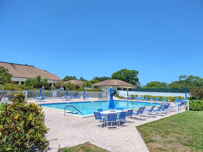 Building Photo - Bird Bay Village Annual Rental – Furnished 1st Floor Unit with Covered Parking