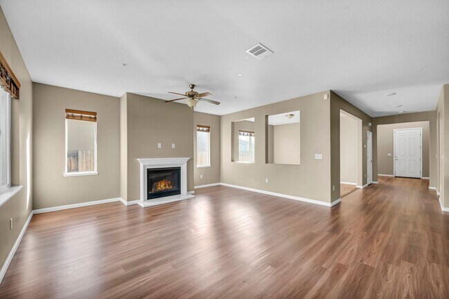 Building Photo - Sun-Filled, Spacious Living with a Three-Car Garage