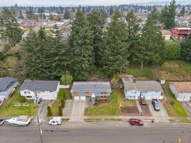 Building Photo - Renovated Tacoma Home with A/C, Huge Den, Bonus Office & Fully Fenced Yard!