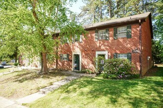 Building Photo - Fully Renovated 2BR Townhome-Style Condo – Available Now!