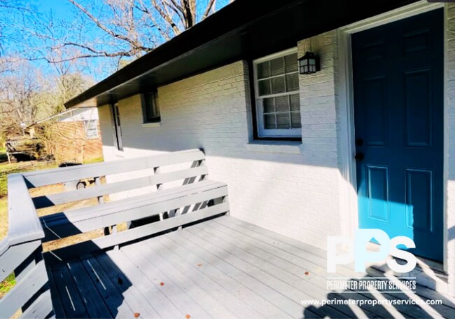 Building Photo - 6127-6129 E Fayetteville Dr