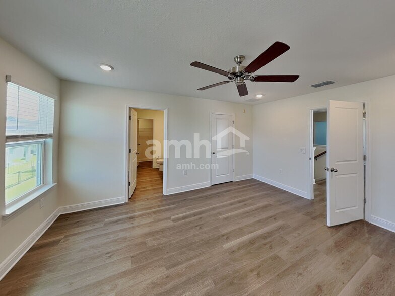 Building Photo - 5944 Pinewood Ests Dr