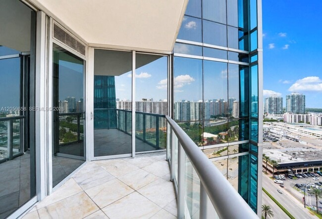 Building Photo - 17121 Collins Ave