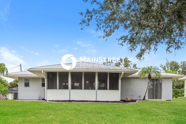 Building Photo - 3 Bedroom Pet-Friendly Home in PORT CHARLOTTE, FL with Main Street Renewal