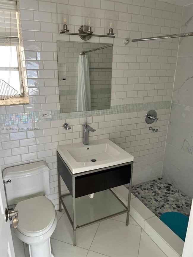 Building Photo - 9910 Collins Ave