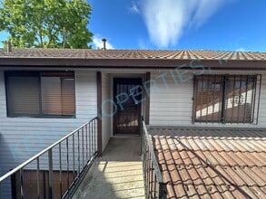 Building Photo - Charming 2-Bedroom / 2-Full Bathroom Condo Retreat in Happy Valley – Cozy Living Awaits!