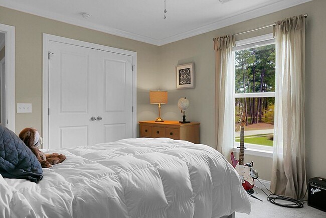 Building Photo - Johns Island 4BR, 2.5 BA Gem: Features Wood Floors, 2-Car Garage, & Community Pool