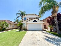 Building Photo - Open-Concept 3 Bedroom 2.5 Bathroom Home with Soaring Ceilings & Spacious Backyard