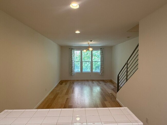 Building Photo - Large 3-Bedroom, 3.5 Bathroom Townhome in Metro Walk Village Neighborhood