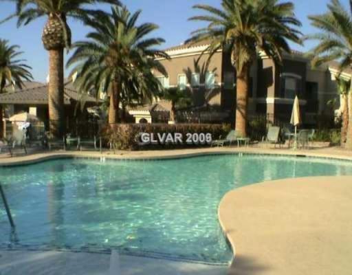 Building Photo - *CUTE 2 MASTER BEDROOM CONDO IN GATED COMMUNITY!!*