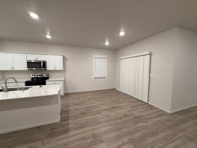 Building Photo - New Construction 4 Bed Mead School District Rancher w/ Fully-Fenced Yard and Attached Garage!