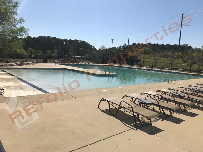 Building Photo - Beautiful 3 Story 3 Bedroom Townhouse with Huge 1st Floor Flex Space with Access to Patio + 2 Car...