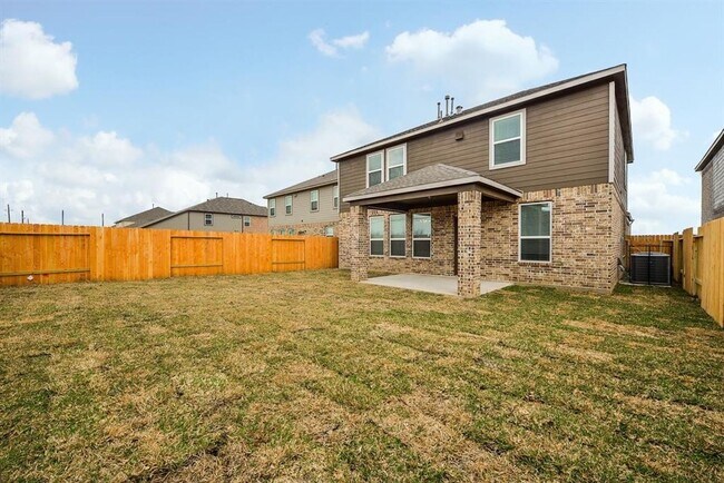 Building Photo - Beautiful stone front 4 bedroom, 3 bath home has bay windows in breakfast nook & master. It is on...