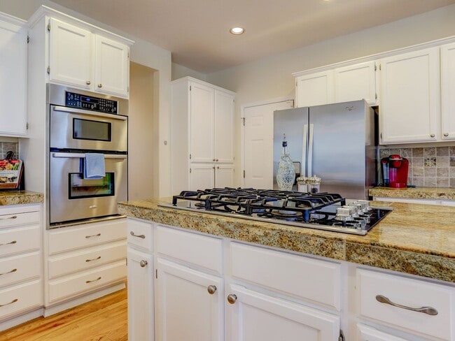Building Photo - Traditional Hillshire Estates  home with 4-bedrooms and 3-baths and GREAT Mountain Views
