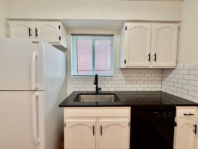 Building Photo - Immaculately Improved 2 Bedroom / 1 Bathroom Duplex & Immediately Available!