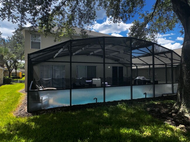 Building Photo - STUNNING Emerald Island Resort 5 bedroom 4...