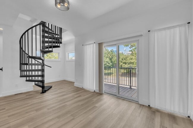 Building Photo - Modern New Construction Townhome with Roof...
