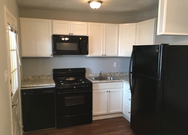 Upgraded Unit - Kitchen - Palmwood Place Apartments