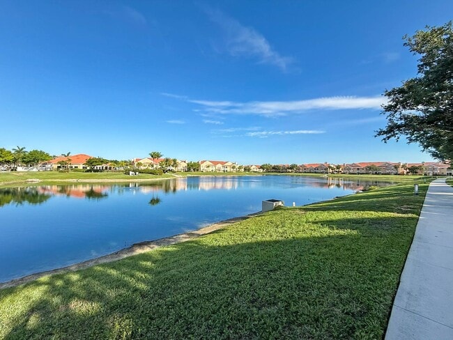 Building Photo - Beautiful 3-Bedroom Condo with 2-Car Garag...