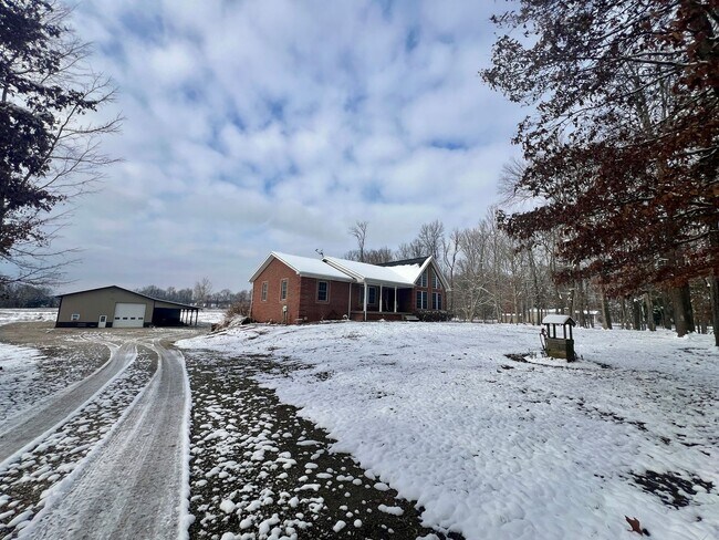 Building Photo - Gorgeous brick home with room to roam!