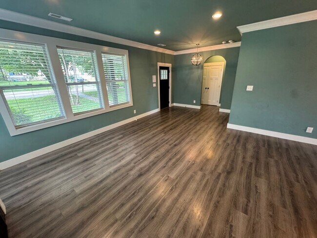 Building Photo - Modern Bungalow Charm: Designer Finishes & Expansive Backyard Living!