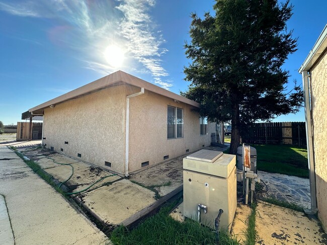 Building Photo - Three Bedroom - Country Living