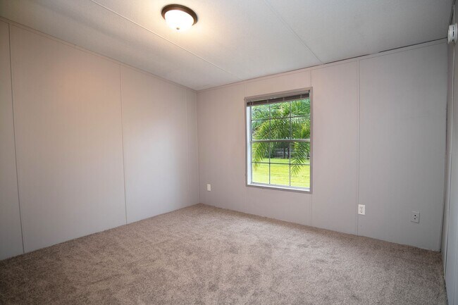 Building Photo - Home on half acre with land and storage