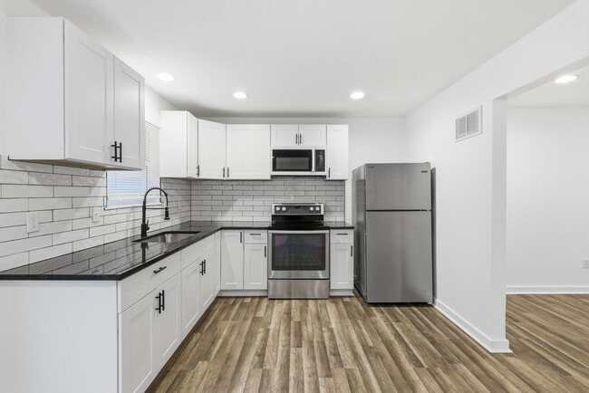 Building Photo - Everything upgraded on this 4 bedroom — to...