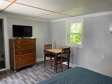Building Photo - Fully furnished. Utilities included.