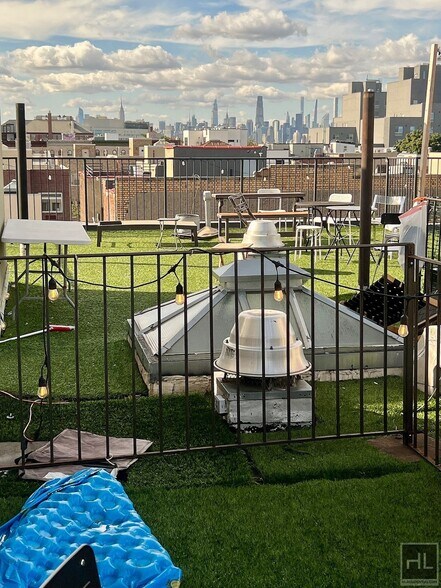 Building Photo - 2BR Penthouse w/ Balcony & Private Rooftop Terrace on Bushwick E. Williamsburg Border