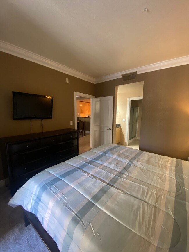 Building Photo - Fully furnished 2 bedroom unit in 24/7 guard gated community