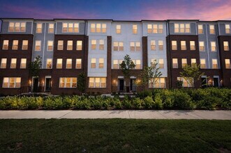 Building Photo - Stunning 2-Level Top Floor Condo with Tesla Charger & 70" TV – Farmstead District