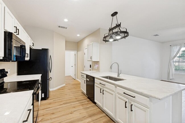Building Photo - 9614 Magna Carta Loop