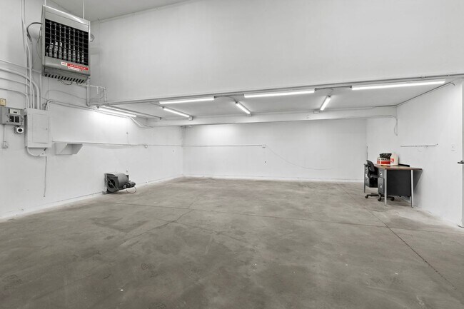 Building Photo - Stunning Home and Three Bay Shop Along Spo...